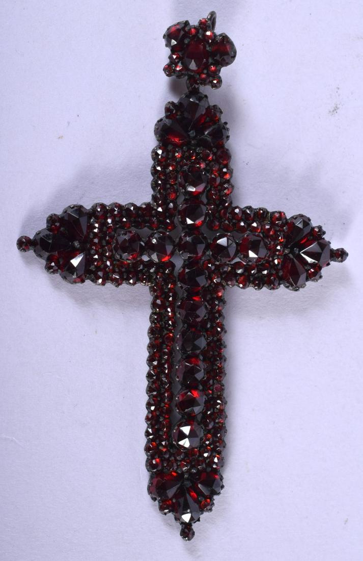 A VINAGE GARNET CROSS PENDANT. 6 cm x 4 cm. (1 of 2)