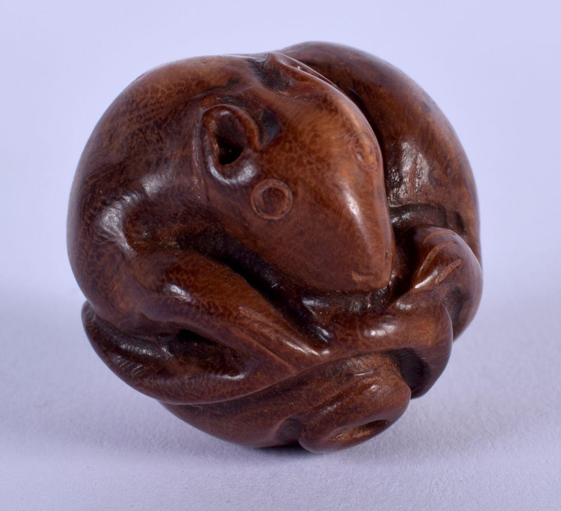 A JAPANESE TAISHO PERIOD CARVED BOXWOOD RAT NETSUKE of (1 of 4)
