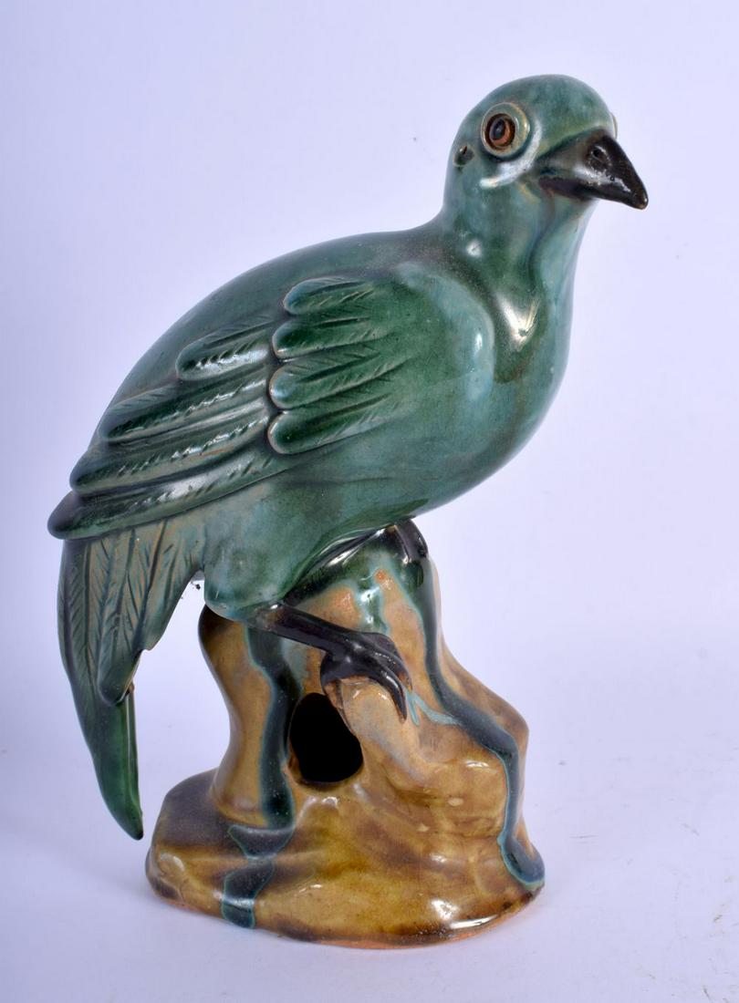 AN EARLY 20TH CENTURY CHINESE GREEN GLAZED POTTERY (1 of 4)