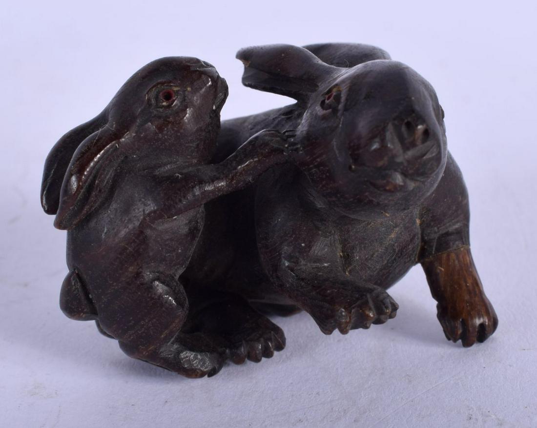 A JAPANESE BOXWOOD HARE NETSUKE. 4.5 cm x 4 cm.: A JAPANESE BOXWOOD HARE NETSUKE. 4.5 cm x 4 cm.