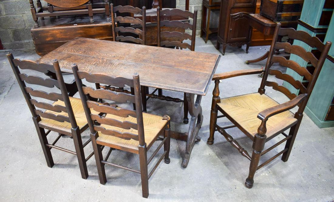 AN ERCOL STYLE DINING TABLE with five chairs: AN ERCOL STYLE DINING TABLE with five chairs. Table 146 cm x 70 cm. (6)