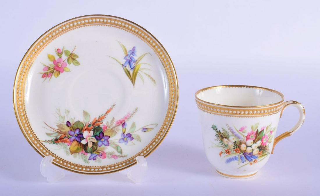 Royal Worcester jewelled coffee cup and saucer painted: Royal Worcester jewelled coffee cup and saucer painted with flowers by George Hundley, pattern 8292, impressed mark c 1880. Cup 7cm High, Saucer 14.5cm Diameter