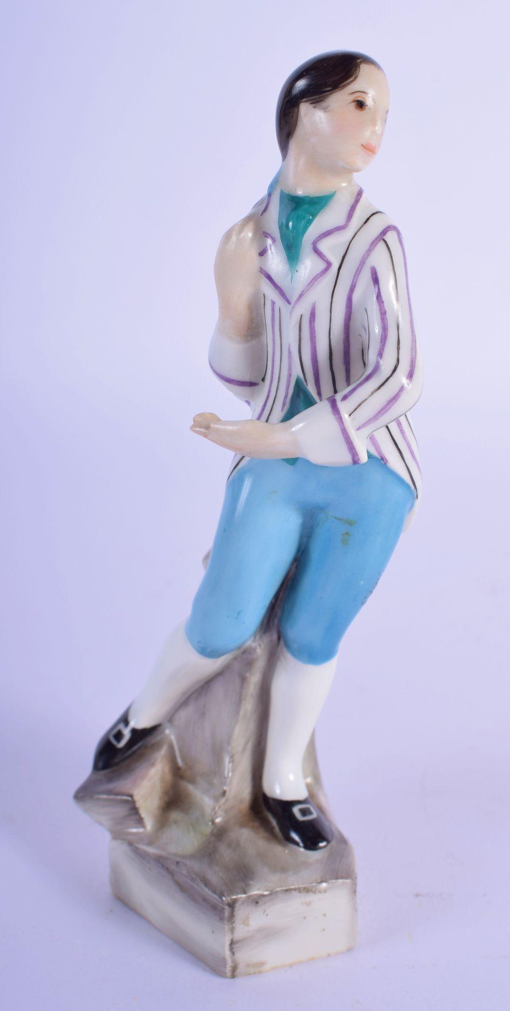 A ROYAL WORCESTER PORCELAIN FIGURE OF A BOY modelled (1 of 3)