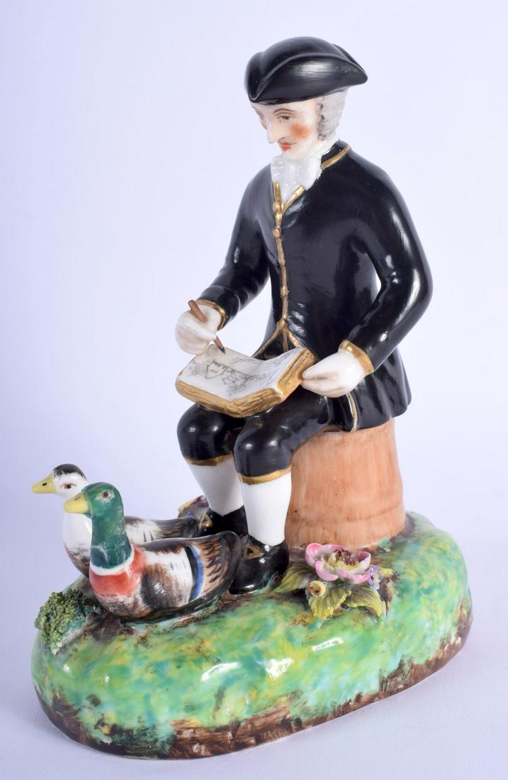AN UNUSUAL EARLY 19TH CENTURY DERBY PORCELAIN FIGURE OF: AN UNUSUAL EARLY 19TH CENTURY DERBY PORCELAIN FIGURE OF AN ARTIST modelled upon an encrusted base. 14 cm x 8 cm.