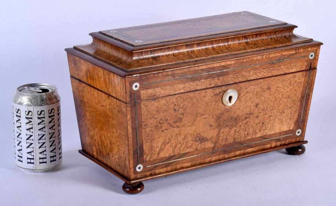 A FINE EARLY 19TH CENTURY SYCAMORE AND FRUITWOOD TEA: A FINE EARLY 19TH CENTURY SYCAMORE AND FRUITWOOD TEA CADDY with George III glass liner and mother of pearl inlay. 32 cm x 20 cm.