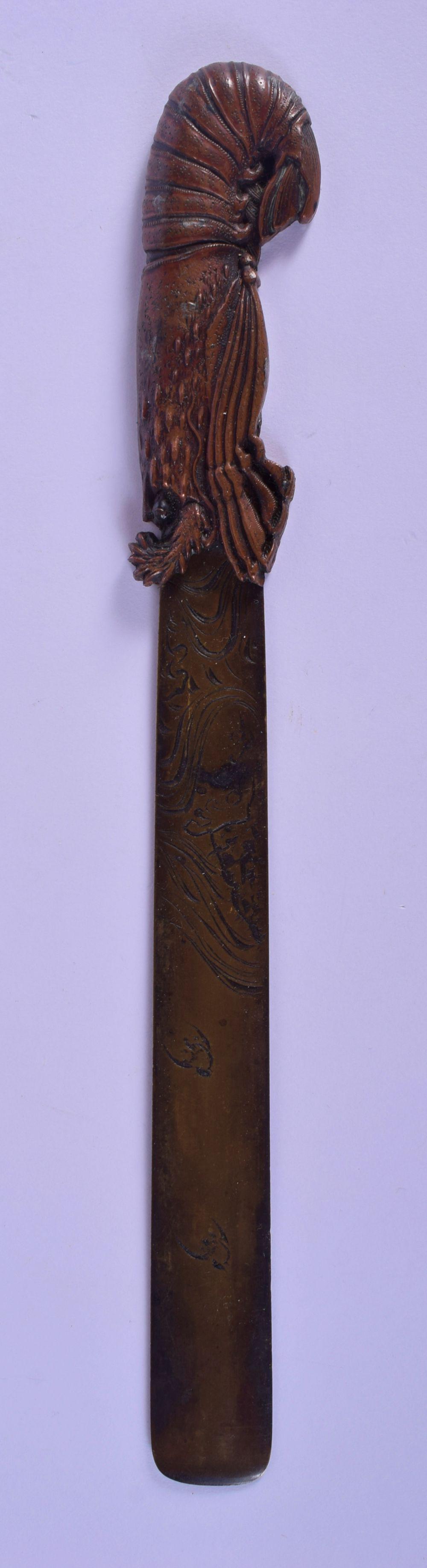 A 19TH CENTURY JAPANESE MEIJI PERIOD MIXED METAL LETTER: A 19TH CENTURY JAPANESE MEIJI PERIOD MIXED METAL LETTER OPENER with lobster handle and engraved blade. 24.5 cm long.