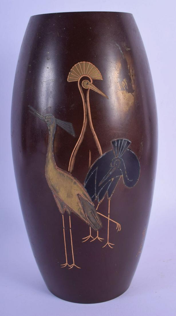 A JAPANESE TAISHO PERIOD MIXED METAL VASE decorated (1 of 3)