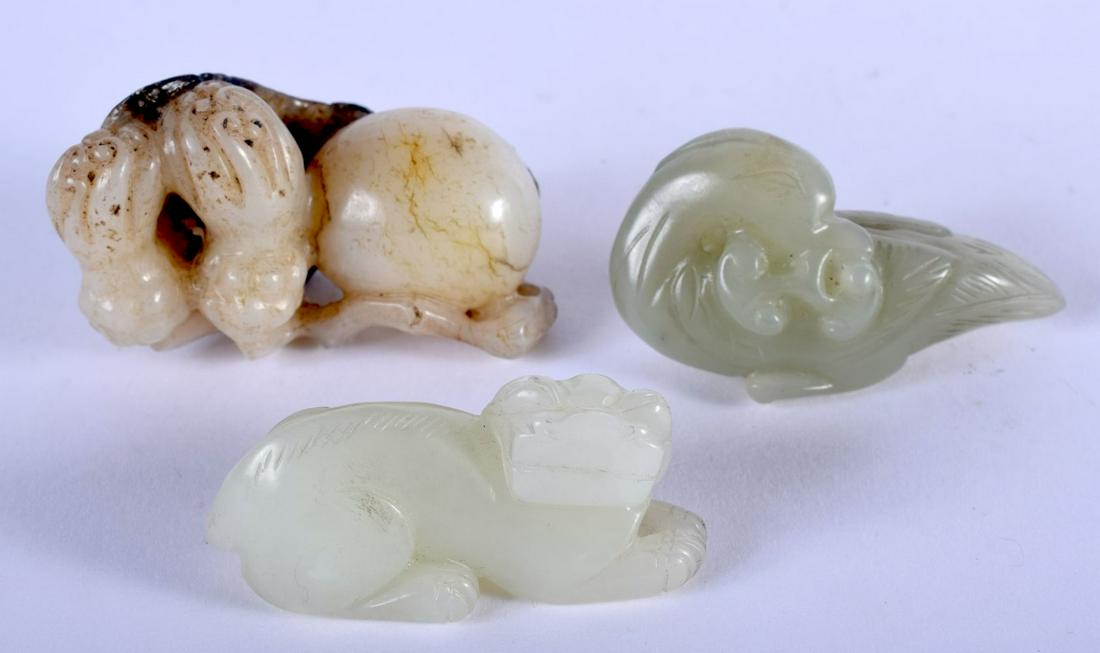 THREE CHINESE CARVED GREEN JADE FIGURES 20th Century . (1 of 3)