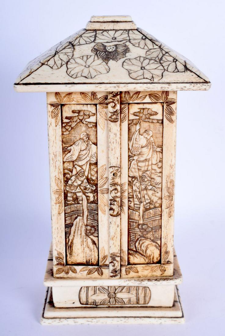 A 19TH CENTURY JAPANESE MEIJI PERIOD CARVED BONE: A 19TH CENTURY JAPANESE MEIJI PERIOD CARVED BONE BUDDHISTIC CABINET formed with figures within an interior. 20 cm x 10 cm.