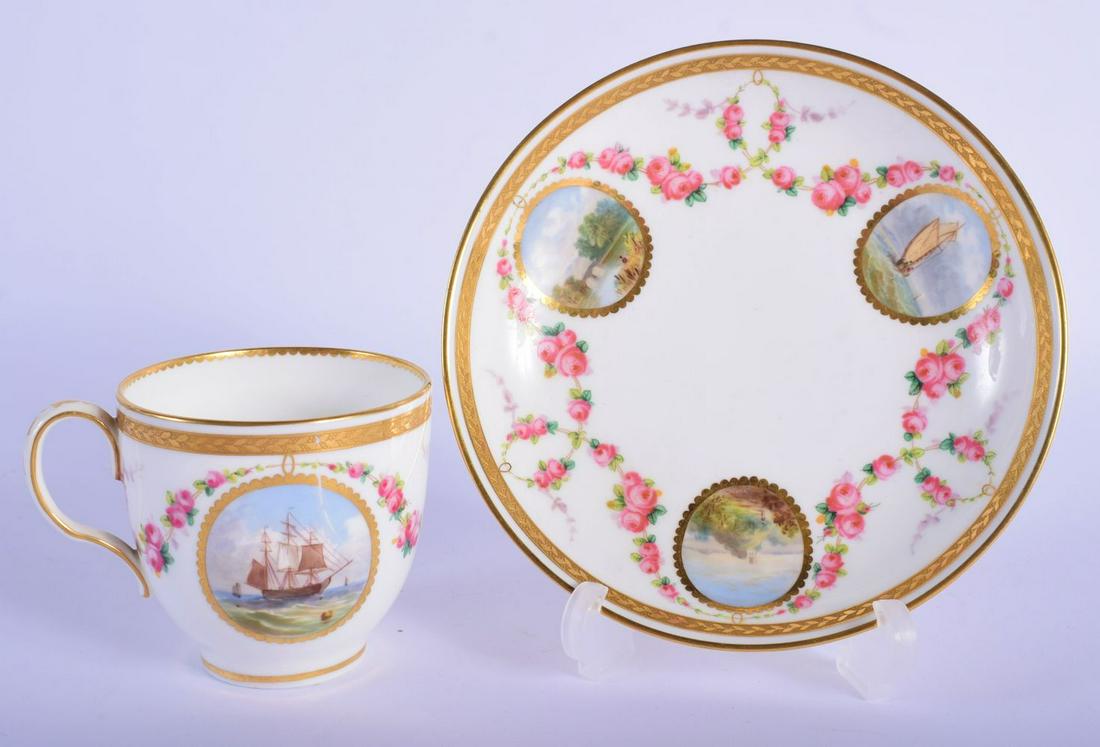 Minton coffee cup and saucer painted with circular: Minton coffee cup and saucer painted with circular panels painted with either landscapes of seascapes c. 1864. Cup 7cm high, Saucer 13.5cm diameter (2)
