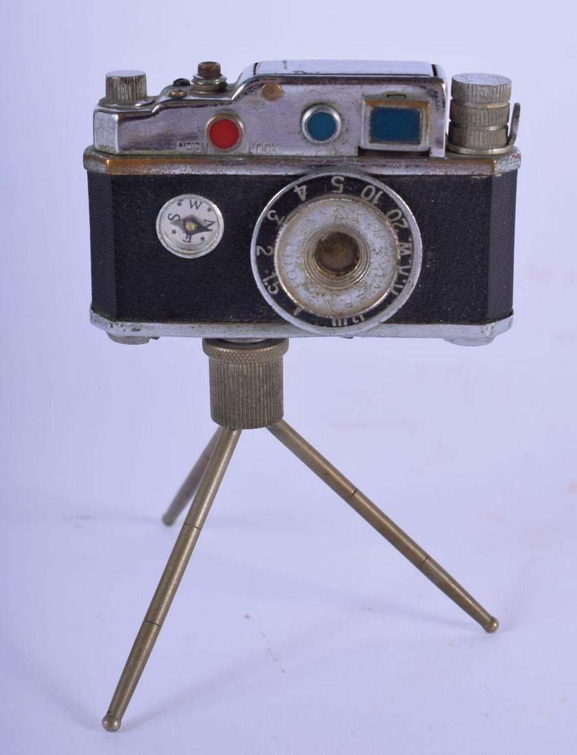 A CHARMING VINTAGE CAMERA LIGHTER. 11 cm x 6 cm.