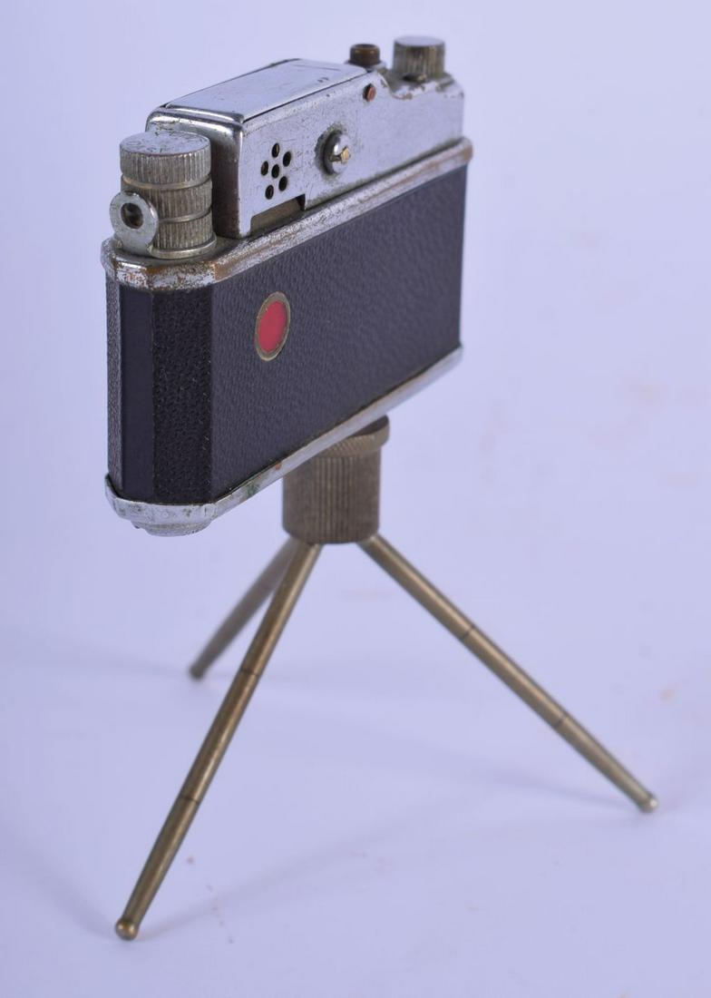 A CHARMING VINTAGE CAMERA LIGHTER. 11 cm x 6 cm.
