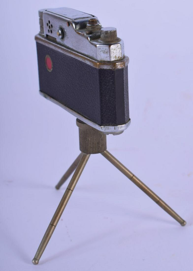 A CHARMING VINTAGE CAMERA LIGHTER. 11 cm x 6 cm.