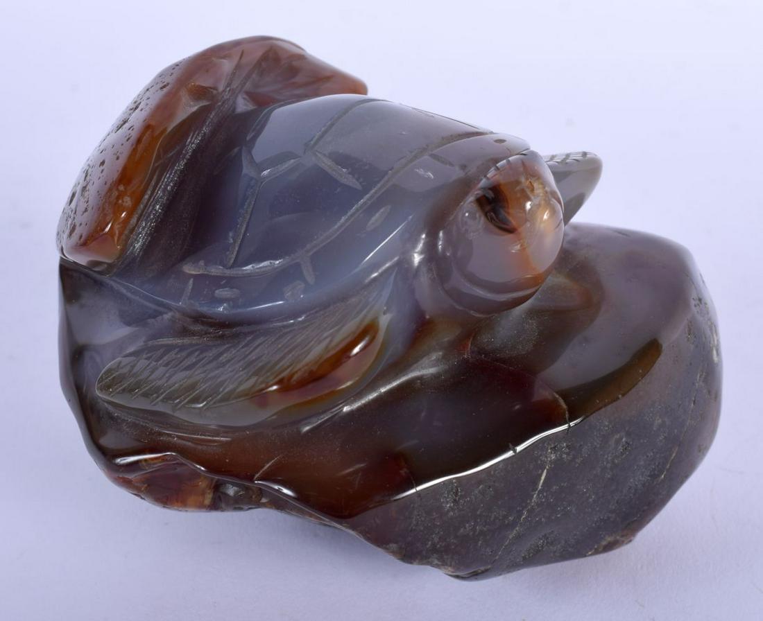 A CHINESE CARVED AGATE BOULDER 20th Century, overlaid (1 of 5)