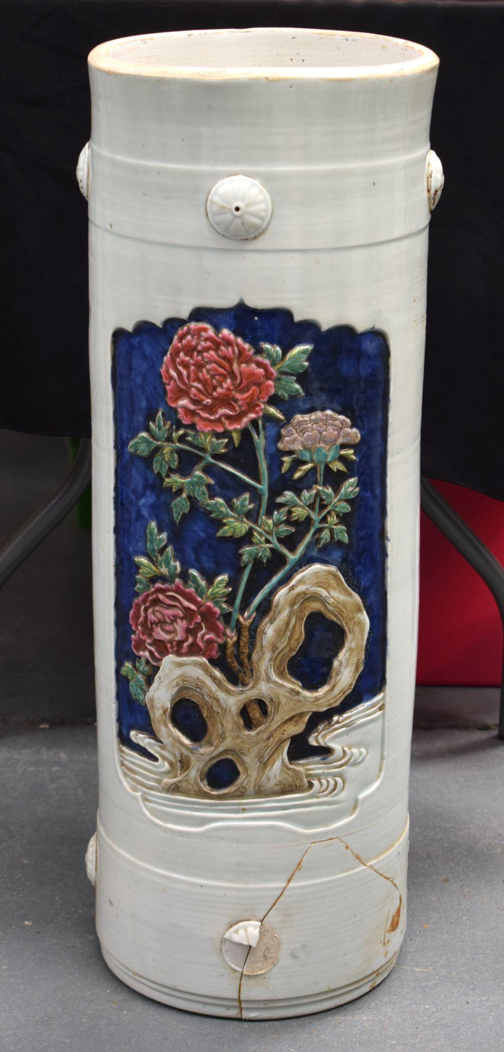 A VERY RARE 18TH CENTURY JAPANESE EDO PERIOD PORCELAIN: A VERY RARE 18TH CENTURY JAPANESE EDO PERIOD PORCELAIN STICK STAND C1750 decorated with flowering rock and bold flowers. 74 cm x 20 cm.