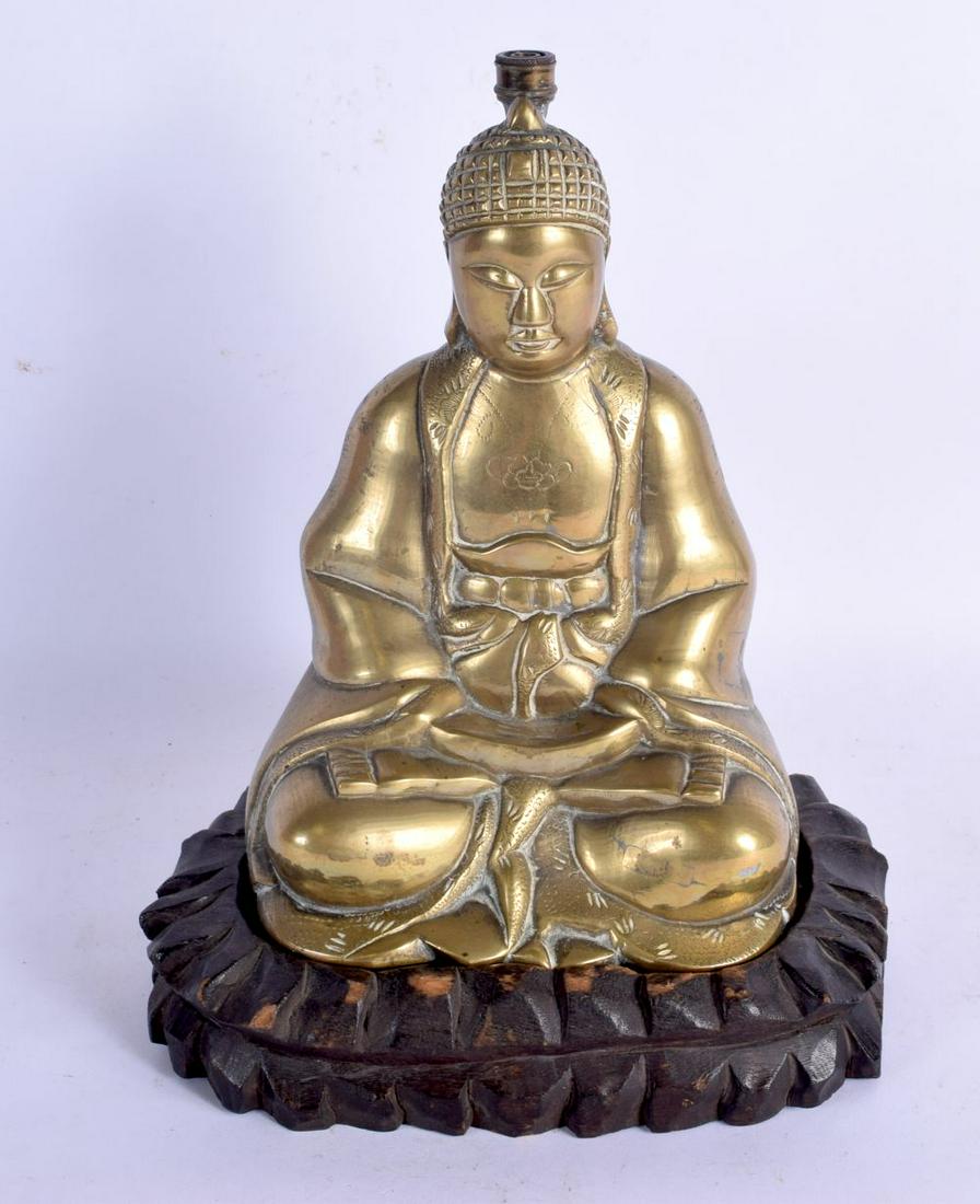 A 19TH CENTURY CHINESE POLISHED BRONZE FIGURE OF A: A 19TH CENTURY CHINESE POLISHED BRONZE FIGURE OF A BUDDHA upon a fitted hardwood base. Buddha 24 cm x 16 cm.
