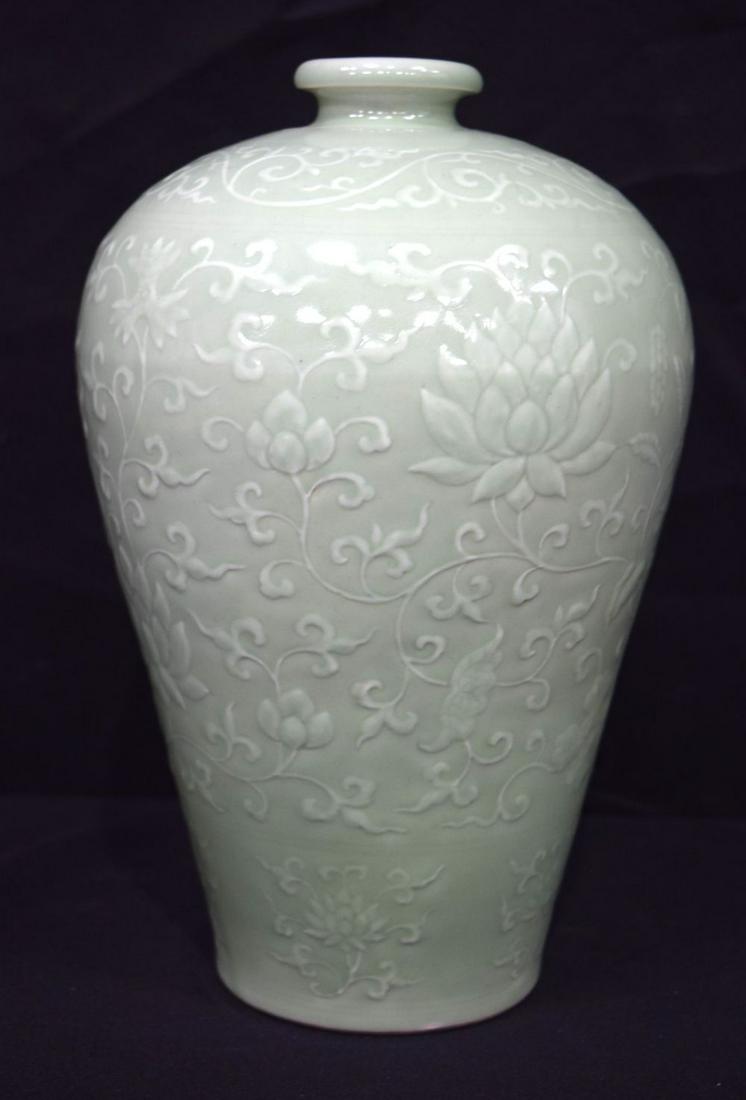 A Chinese porcelain Celadon Meiping vase decorated with (1 of 6)