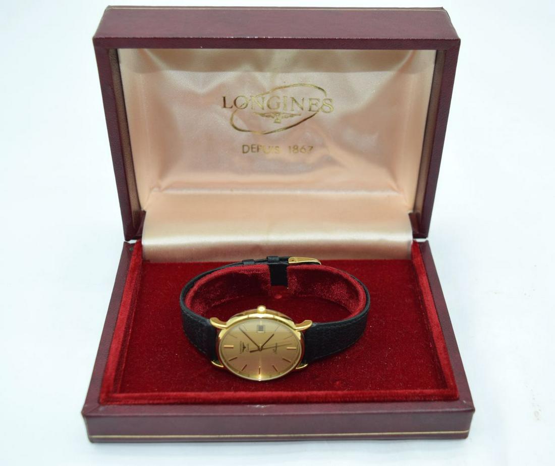 A boxed Longines Presence wristwatch . (1 of 3)