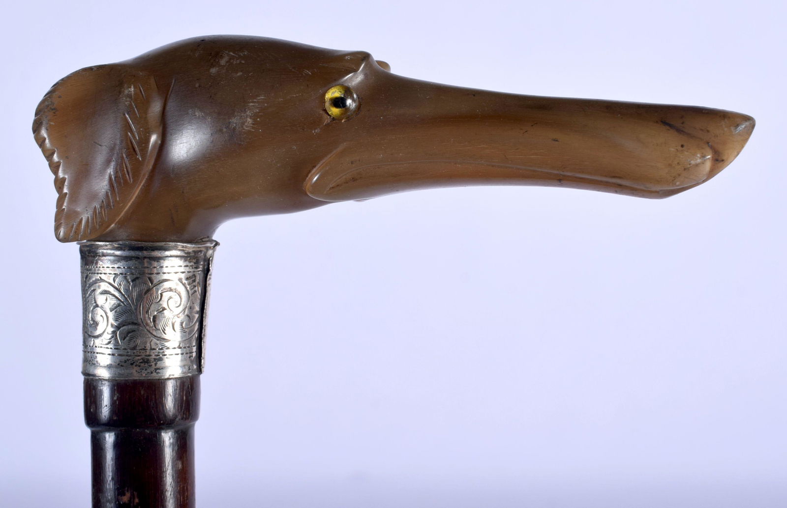 AN ANTIQUE CARVED RHINOCEROS HORN SILVER MOUNTED (1 of 3)