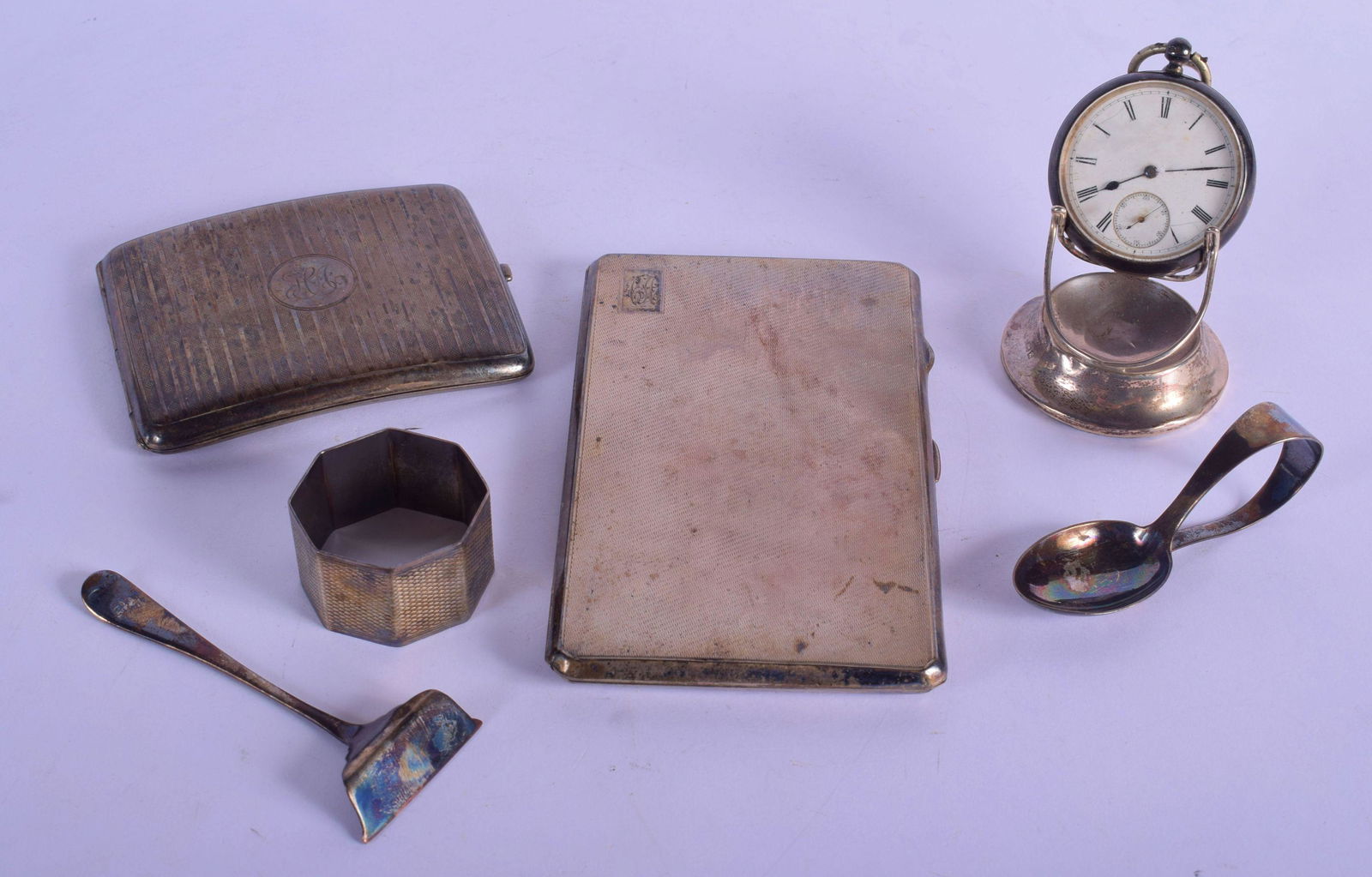 AN ART DECO SILVER CIGARETTE CASE together with other (1 of 7)