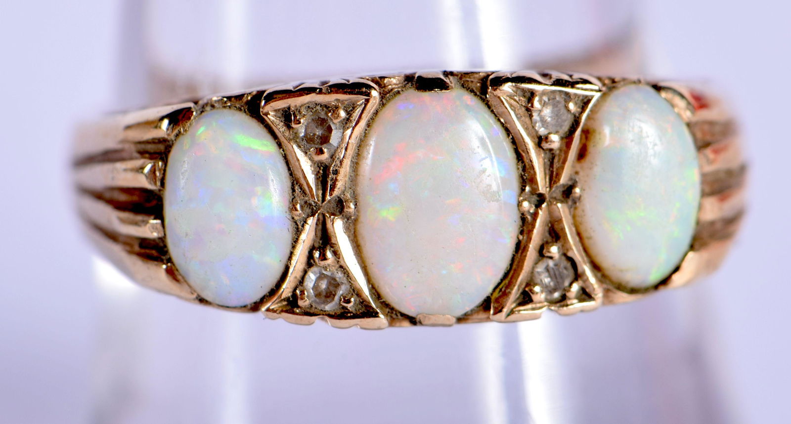 A 9CT GOLD AND OPAL RING.  Size P, weight 2.96g (1 of 3)