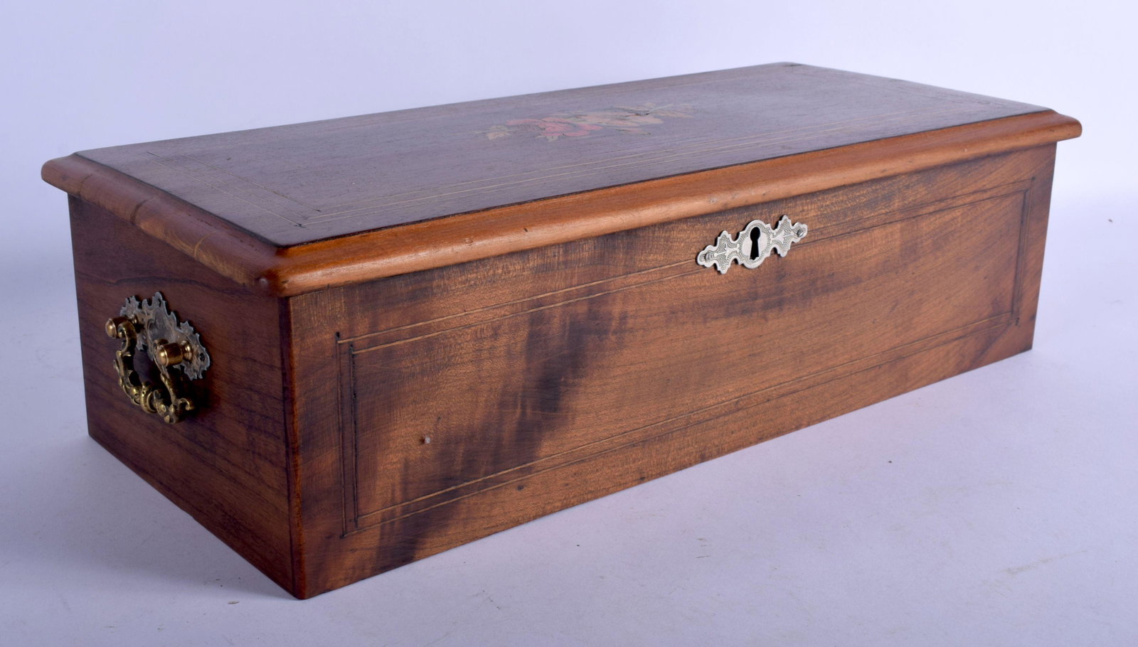 A 19TH CENTURY SWISS NICOLE FRERES GENEVE MUSIC BOX: A 19TH CENTURY SWISS NICOLE FRERES GENEVE MUSIC BOX with original painted and gilded interior stamp. 45 cm wide wide, cylinder 21 cm wide.