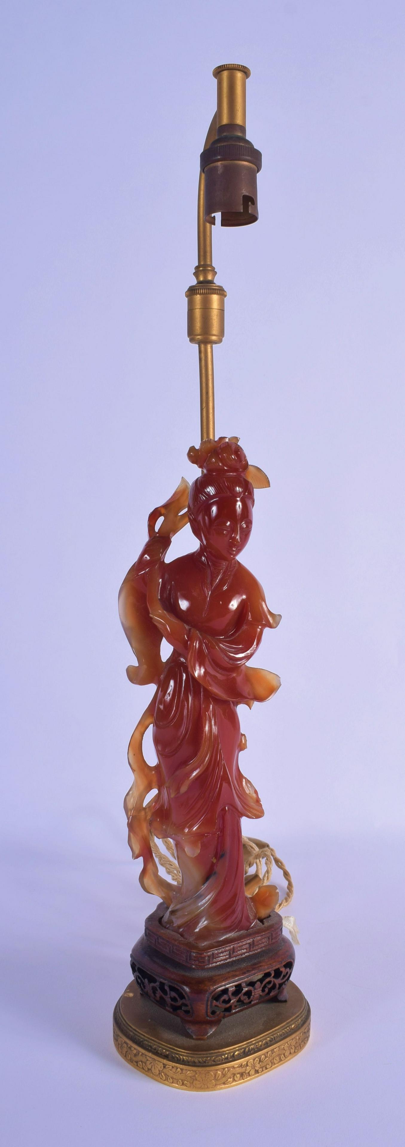 AN EARLY 20TH CENTURY CHINESE CARVED AGATE FIGURE OF (1 of 4)