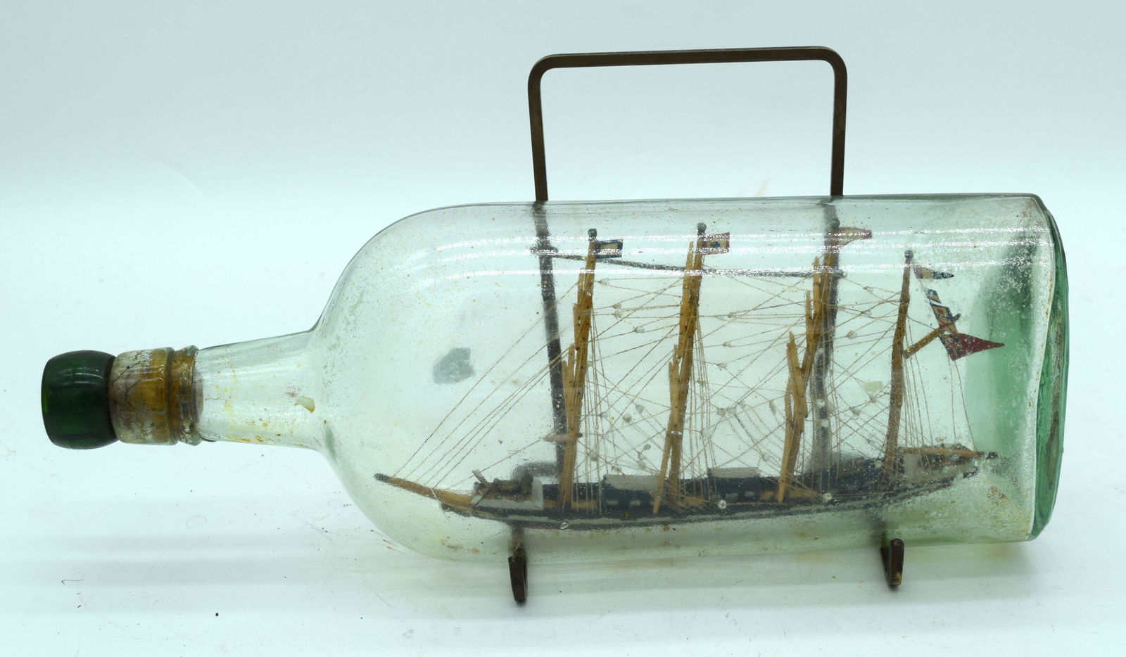 An antique ship in a bottle 30cm . (1 of 3)