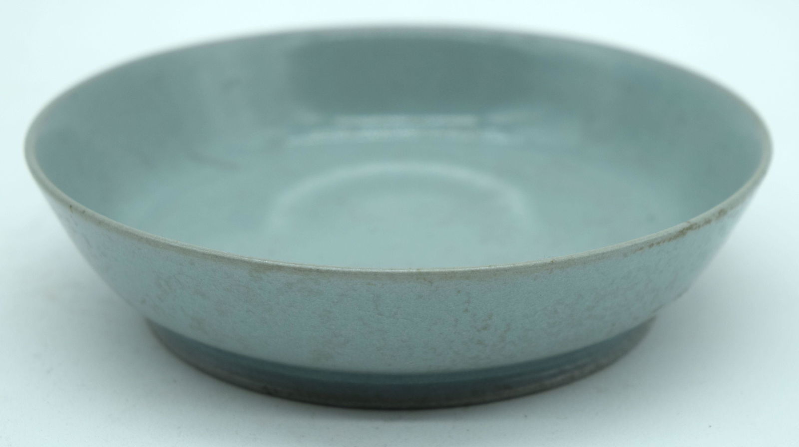 A small Chinese porcelain Celadon dish 3 x 13 cm. (1 of 3)