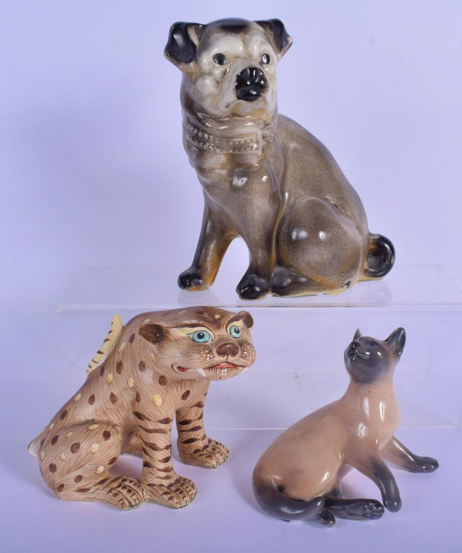 A VINTAGE ITALIAN POTTERY FIGURE OF A CAT together with: A VINTAGE ITALIAN POTTERY FIGURE OF A CAT together with a pottery dog & Copenhagen cat. Largest 24 cm x 12 cm. (3)