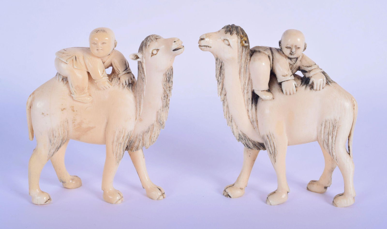 A PAIR OF 19TH CENTURY CHINESE CARVED IVORY FIGURES OF (1 of 3)