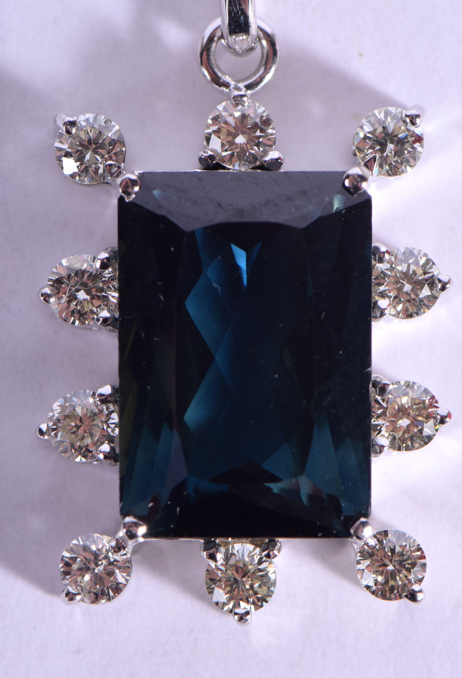 A 9CT GOLD SAPPHIRE AND DIAMOND PENDANT NECKLACE with (1 of 5)