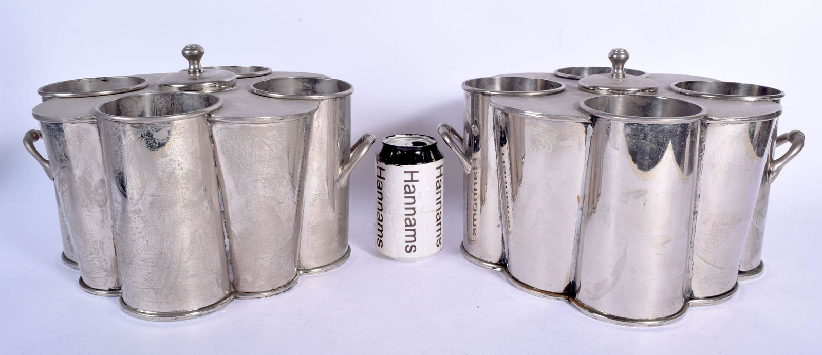 A PAIR OF 1970S SILVER PLATED BOTTLE HOLDERS in the art (1 of 4)