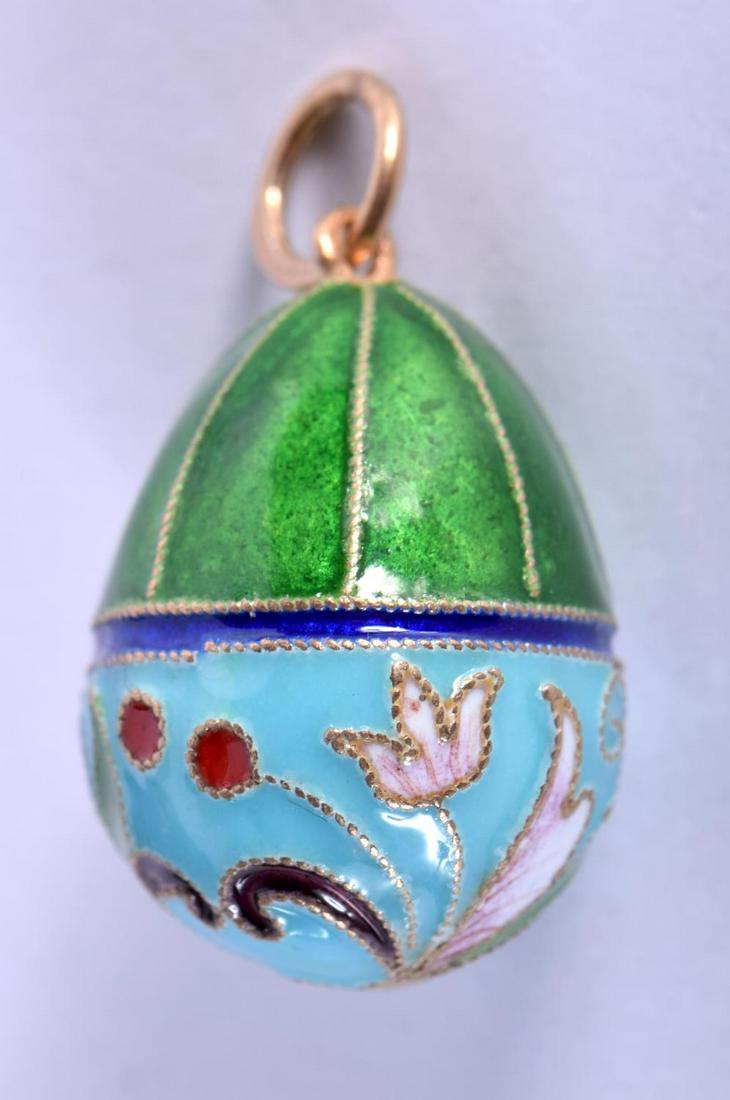 A CONTINENTAL SILVER AND ENAMEL EGG PENDANT. 6.2 grams. (1 of 4)