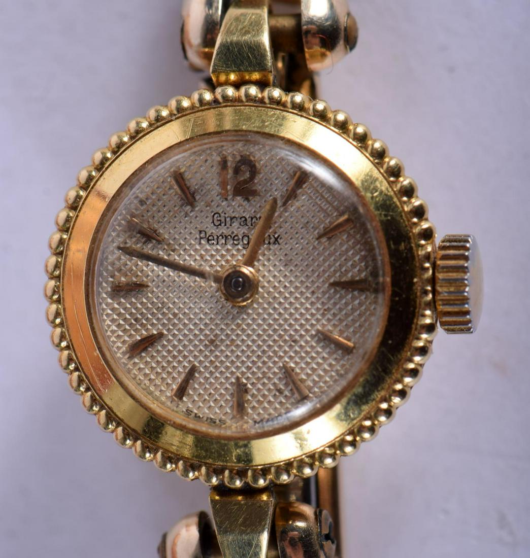 AN 18CT GOLD LADIES WRISTWATCH. 13.8 grams. 2 cm wide. (1 of 4)