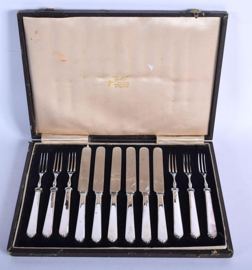 A CASED SET OF SIX SILVER HANDLED CAKE FORKS AND (1 of 4)