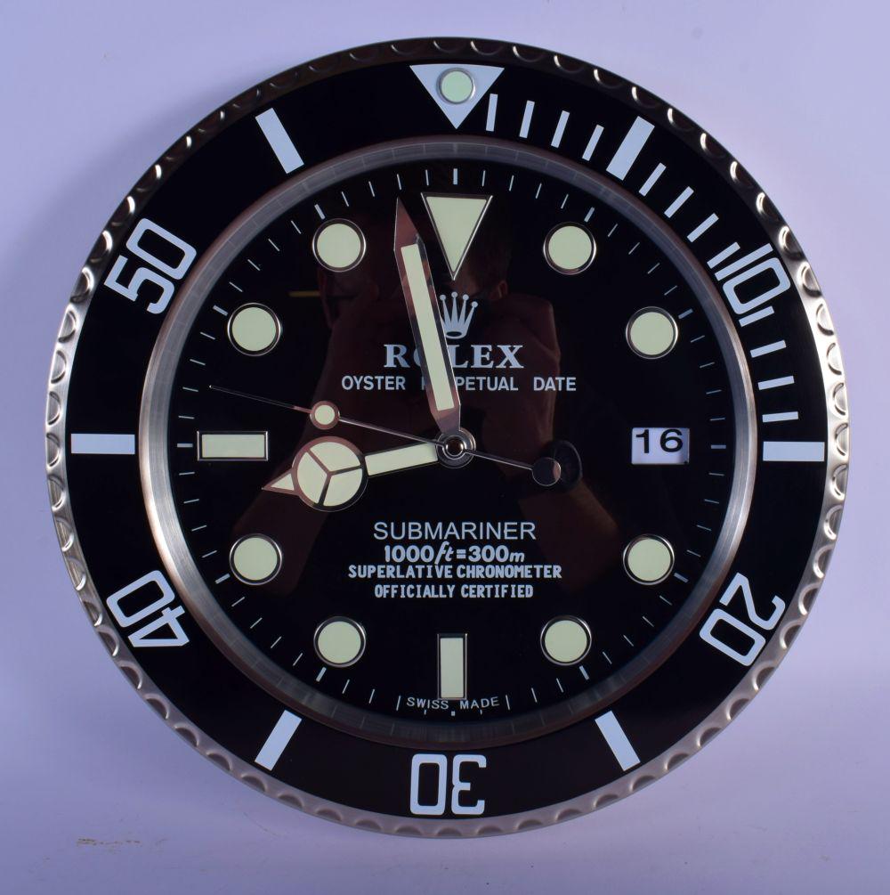 A ROLEX ADVERTISING DEALER DISPLAY HANGING WALL CLOCK.: A ROLEX ADVERTISING DEALER DISPLAY HANGING WALL CLOCK. 30 cm diameter.