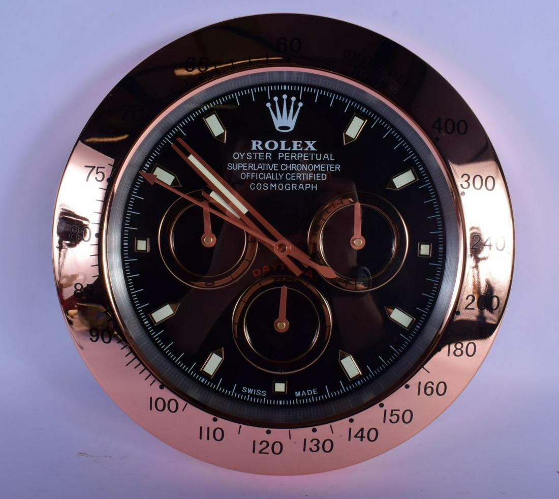 A ROLEX ADVERTISING DEALER DISPLAY HANGING WALL CLOCK.: A ROLEX ADVERTISING DEALER DISPLAY HANGING WALL CLOCK. 30 cm diameter.
