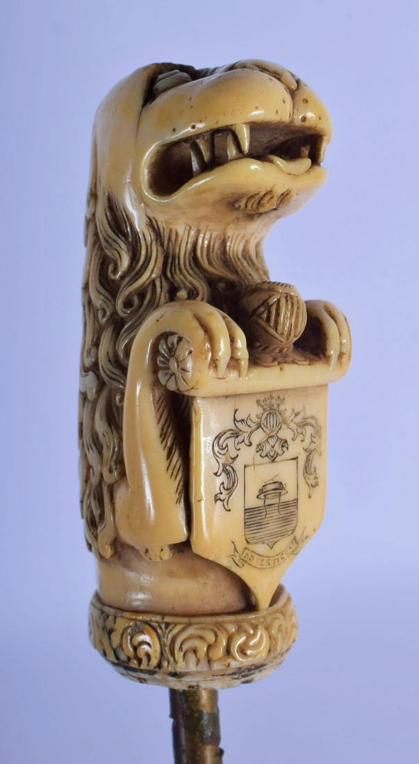 A LATE 17TH CENTURY GERMAN CARVED IVORY HANDLED LION (1 of 4)