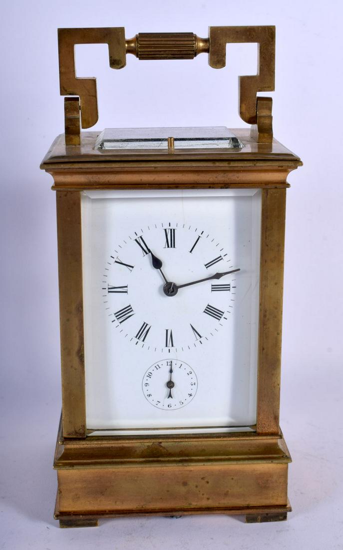 A LATE 19TH CENTURY FRENCH BRASS REPEATING CARRIAGE: A LATE 19TH CENTURY FRENCH BRASS REPEATING CARRIAGE CLOCK with Grand & Petite Sonnerie feature. 20 cm high inc handle.