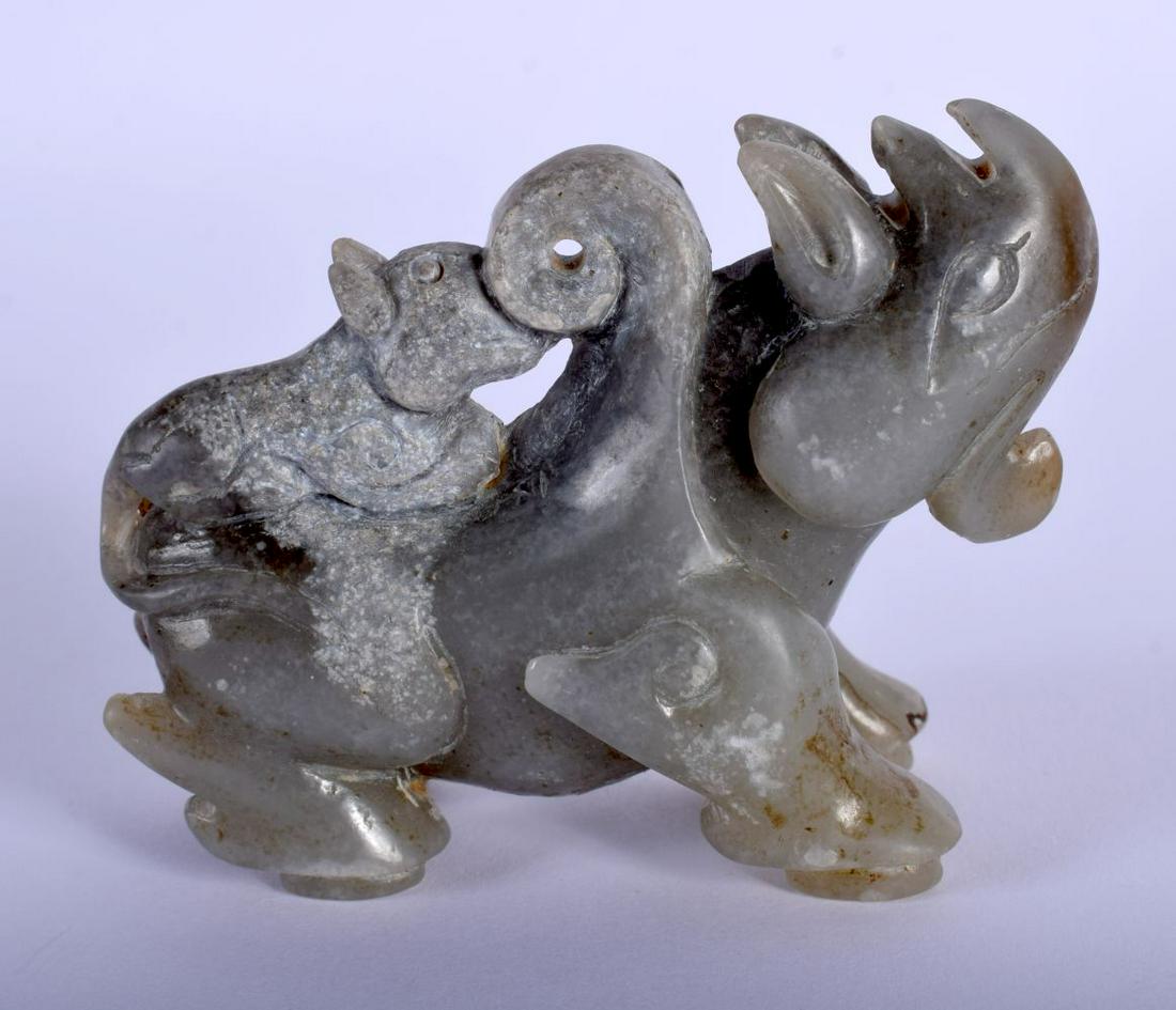 AN EARLY 20TH CENTURY CHINESE CARVED GREEN JADE FIGURE (1 of 3)