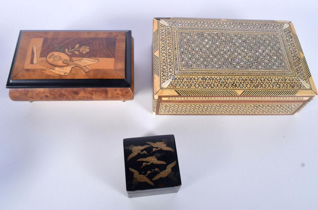 A Swiss Reuge Walnut Burr music box together with an (1 of 5)