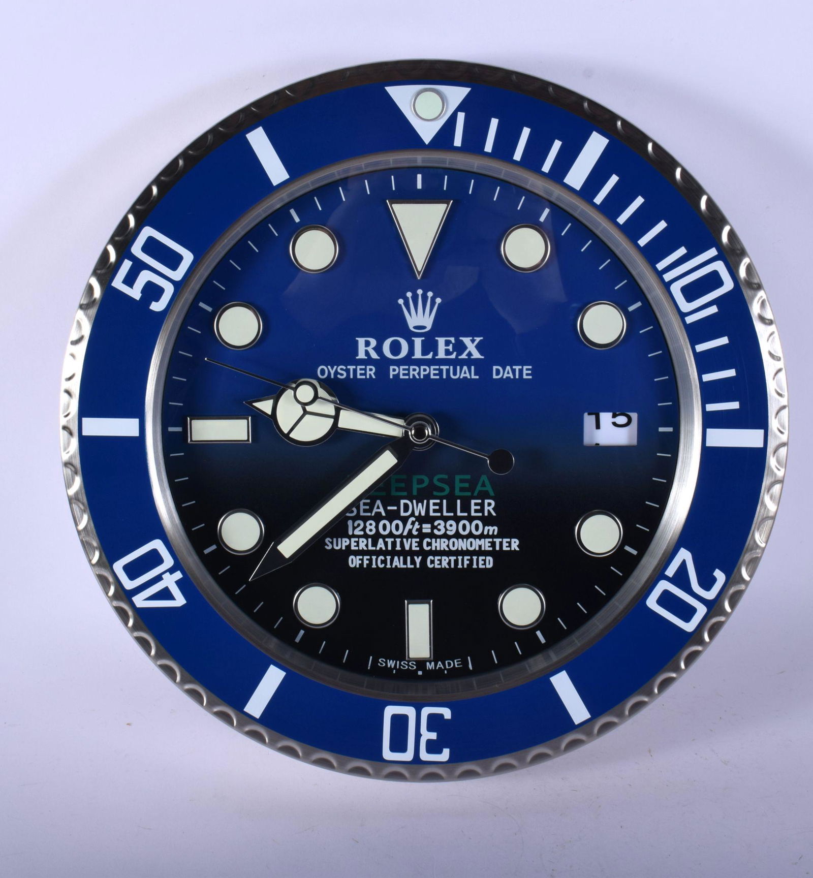 A ROLEX ADVERTISING DEALER DISPLAY HANGING WALL CLOCK.: A ROLEX ADVERTISING DEALER DISPLAY HANGING WALL CLOCK. 30 cm diameter.