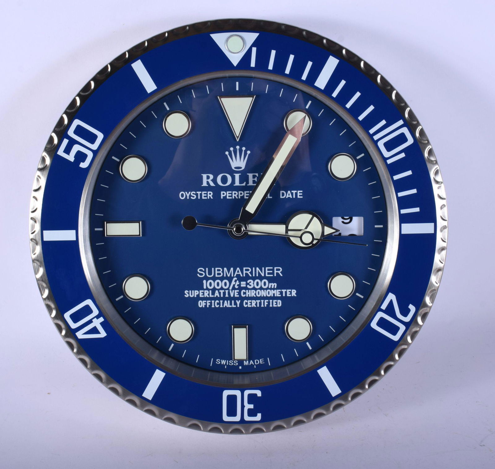 A ROLEX ADVERTISING DEALER DISPLAY HANGING WALL CLOCK.: A ROLEX ADVERTISING DEALER DISPLAY HANGING WALL CLOCK. 30 cm diameter.