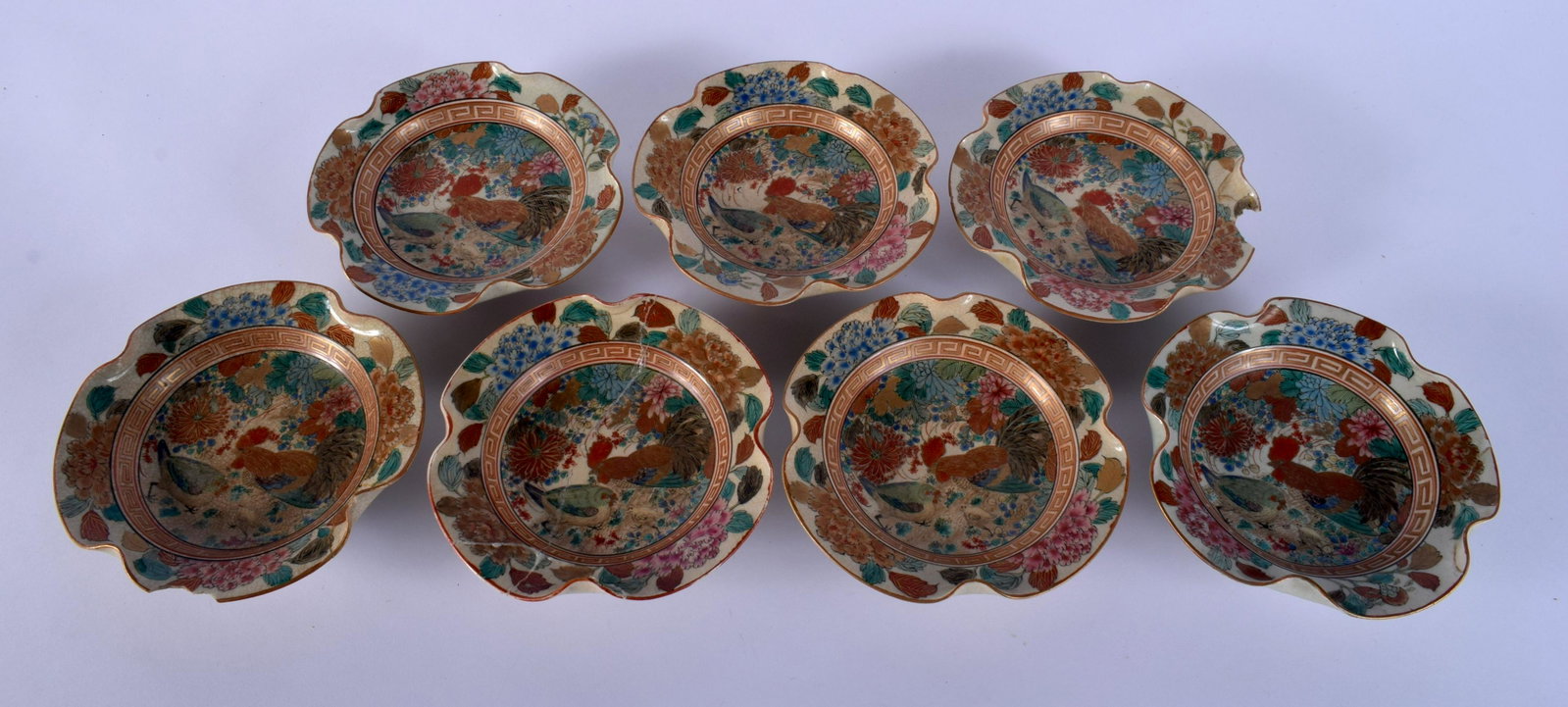 SEVEN LATE 19TH CENTURY JAPANESE MEIJI PERIOD SATSUMA: SEVEN LATE 19TH CENTURY JAPANESE MEIJI PERIOD SATSUMA FOWL PLATES painted with birds and flowers. 15 cm wide. (7)
