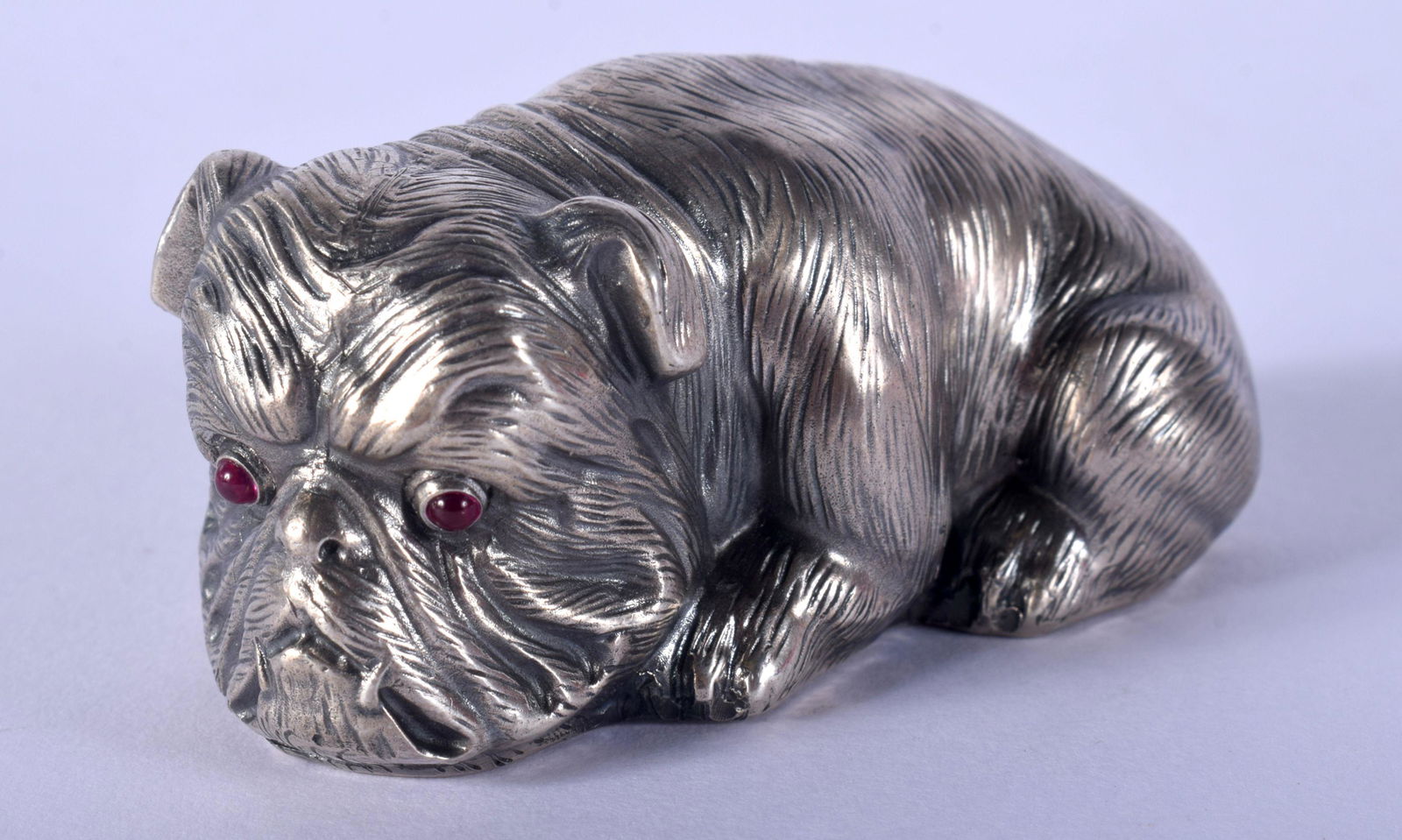 A CONTINENTAL SILVER AND RUBY FIGURE OF A DOG. 60 (1 of 4)