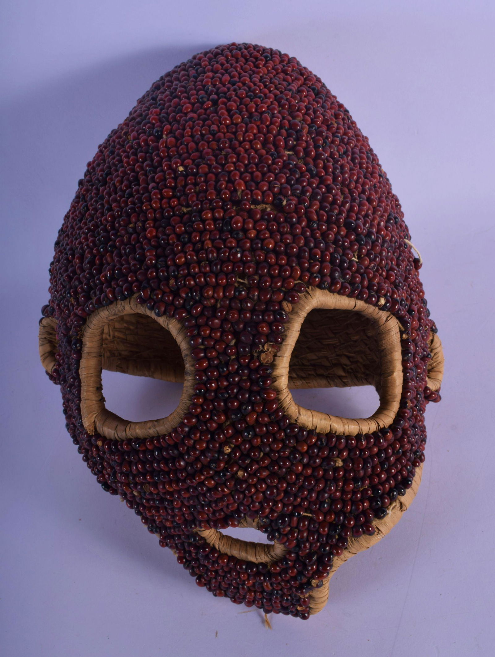 AN UNUSUAL JEWELLED AFRICAN TRIBAL MASK overlaid with (1 of 4)