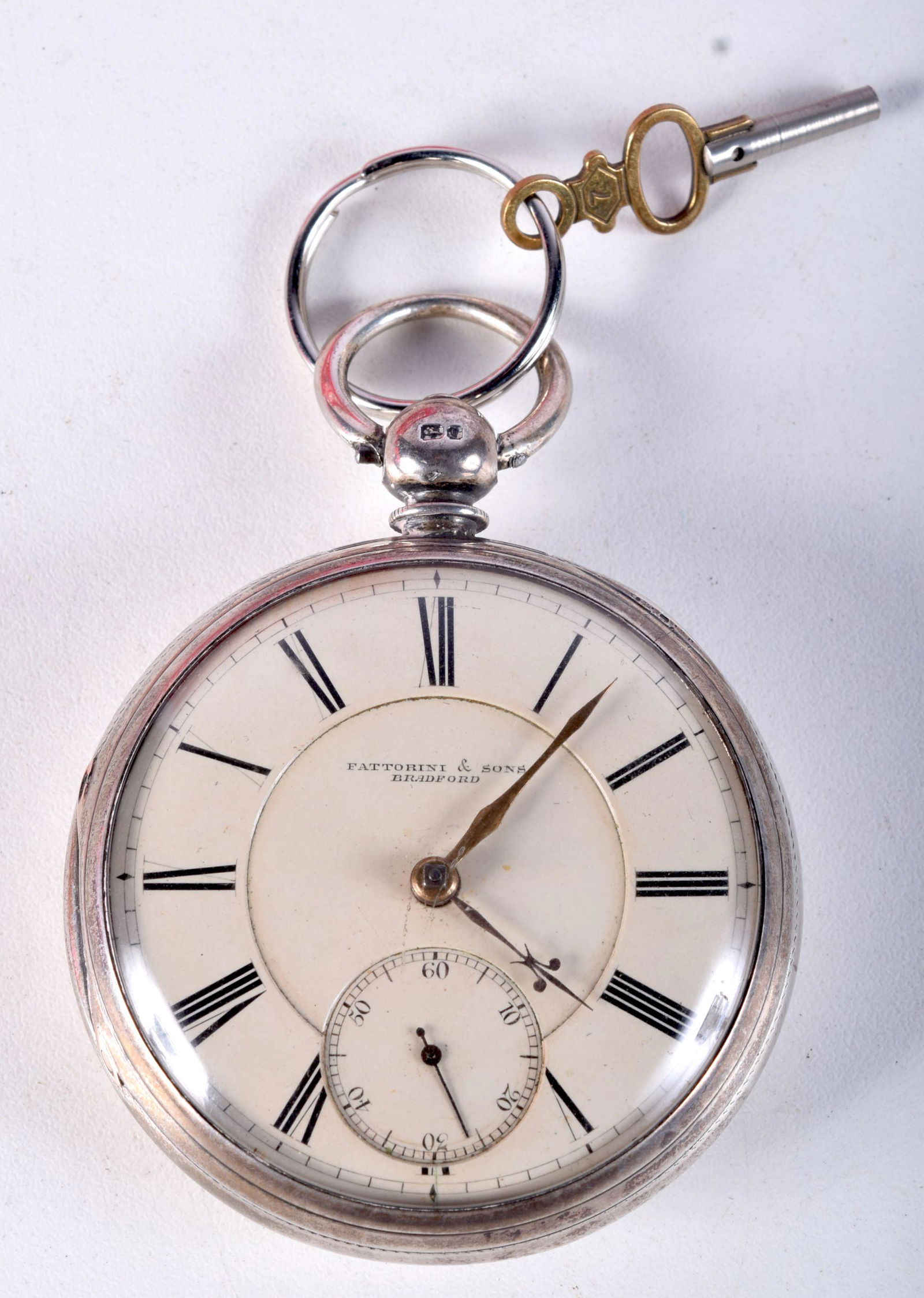 A SILVER POCKET WATCH WITH KEY BY FATTORINI & SONS OF (1 of 5)