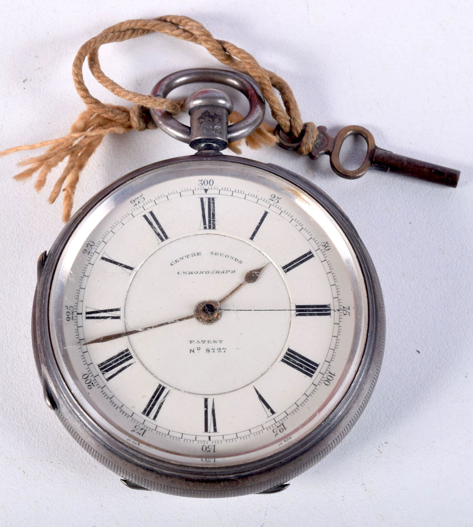 A SILVER CHRONOMETER POCKET WATCH WITH KEY.  Hallmarked (1 of 4)