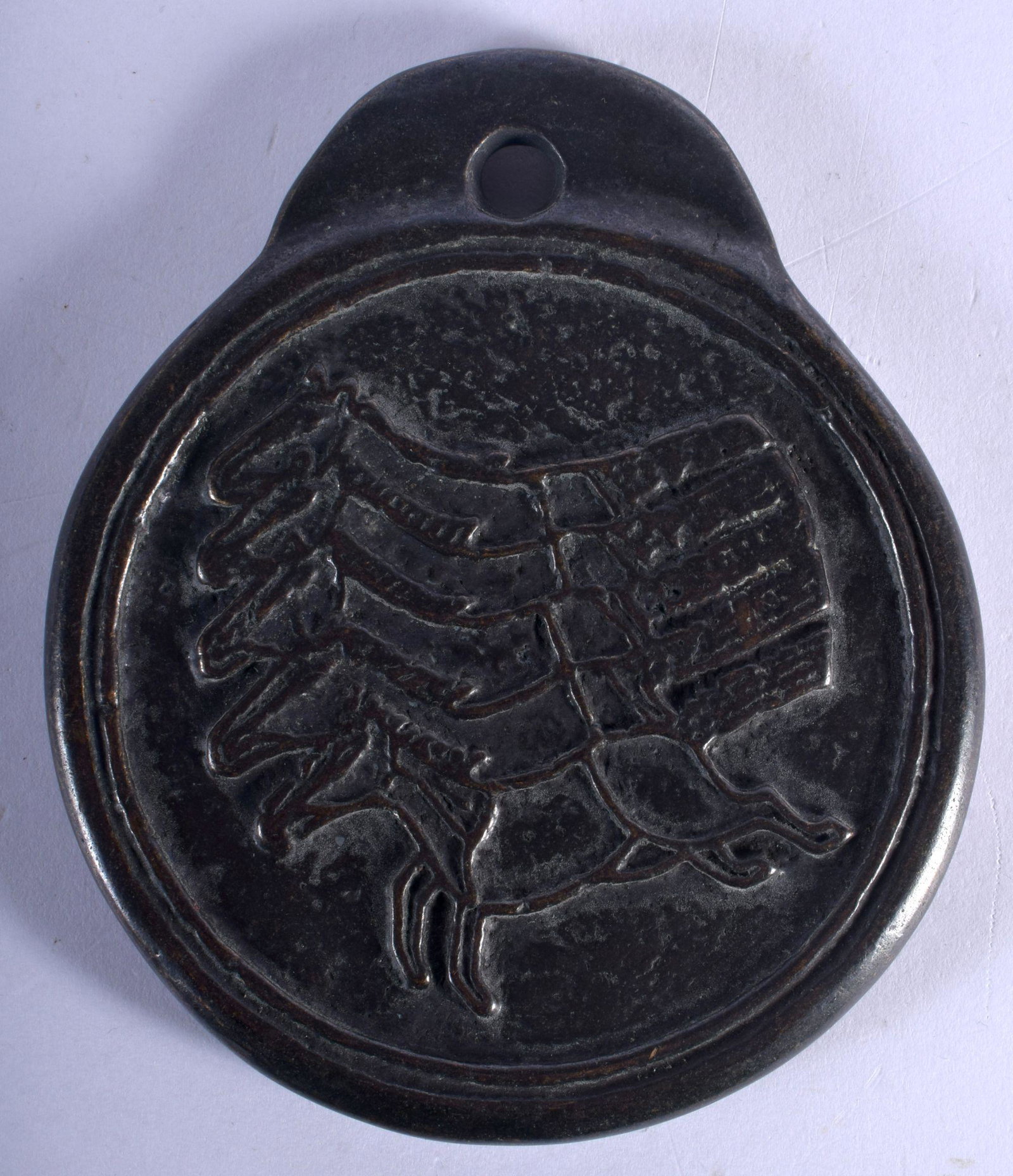 A RARE KOREAN BRONZE HORSE TRADING MEDALLION. 9.5 cm x: A RARE KOREAN BRONZE HORSE TRADING MEDALLION. 9.5 cm x 10 cm.